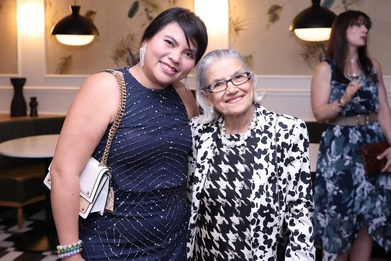 Three guests at a reception