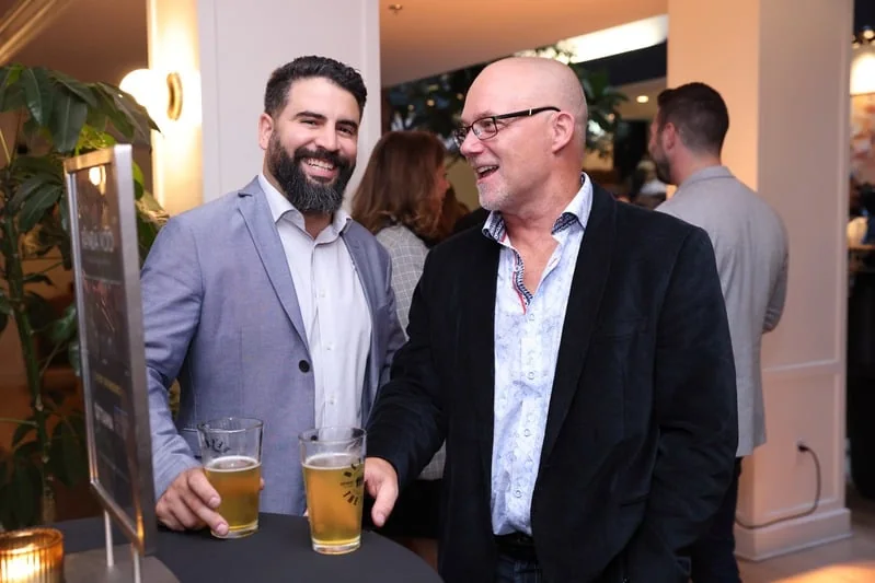 Guests talking at a reception
